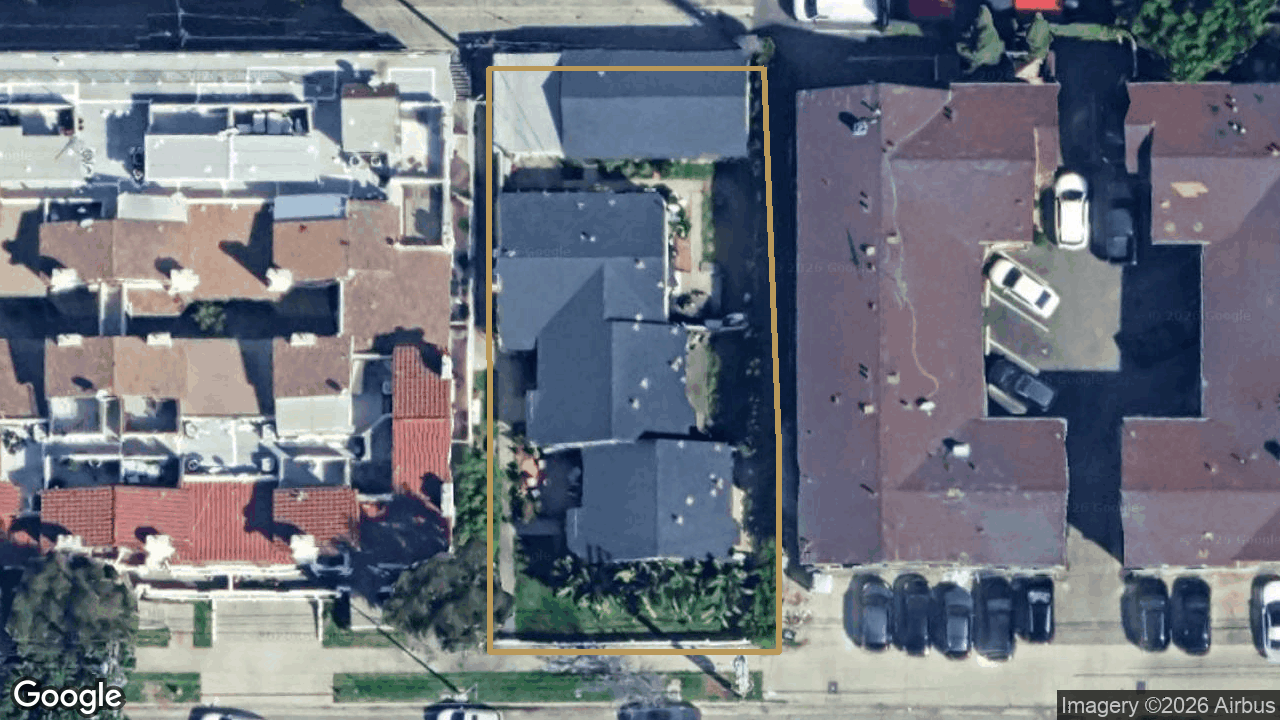 Aerial view of 14719 Magnolia Blvd with the lot outlined in gold